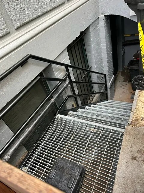 Completed custom steel staircase and railing installation by Steel Masters NYC, Brooklyn, NY