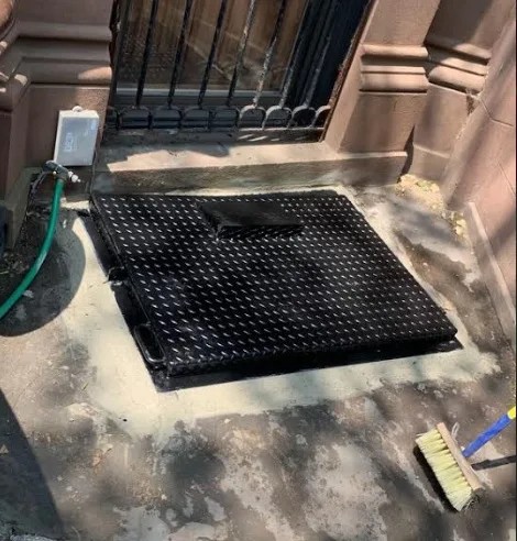 Steel cellar door replacement project completed by Steel Masters NYC in East Flatbush, Brooklyn