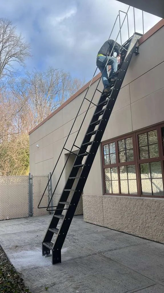 Completed steel staircase project by Steel Masters NYC in Brooklyn, NY — custom iron works